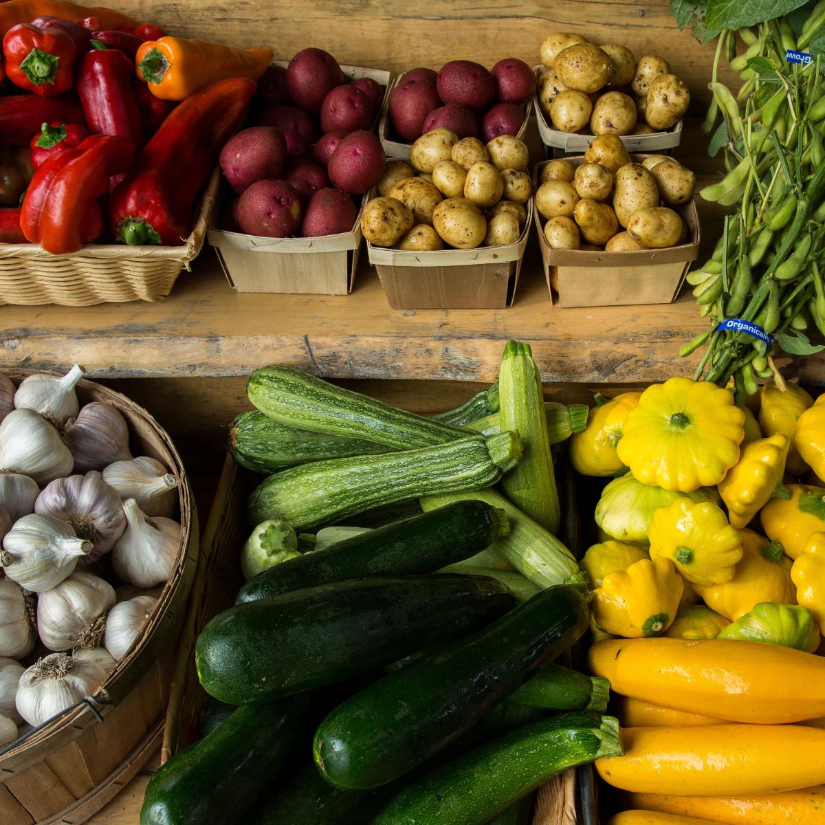 Colorful Vegetables on a Table in Baskets